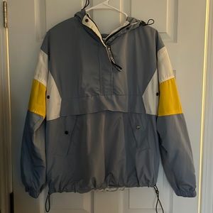 Wind breaker with pouch pocket